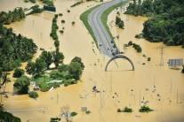 A part of a flooded highway exit is seen in a village in Matara.
