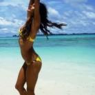 Brazilian Model Alessandra Corine Ambrosio shows off toned figure in vibrant bikini.