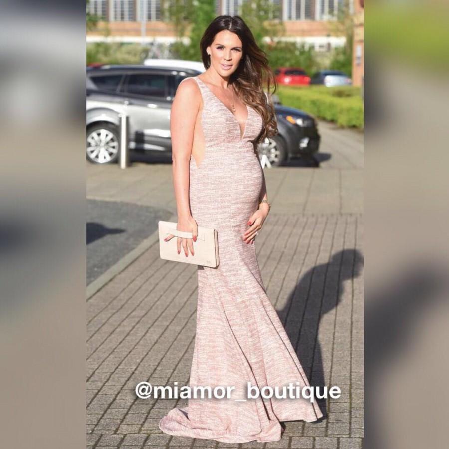 Pregnant Danielle Lloyd shows bump in glam black dress at 