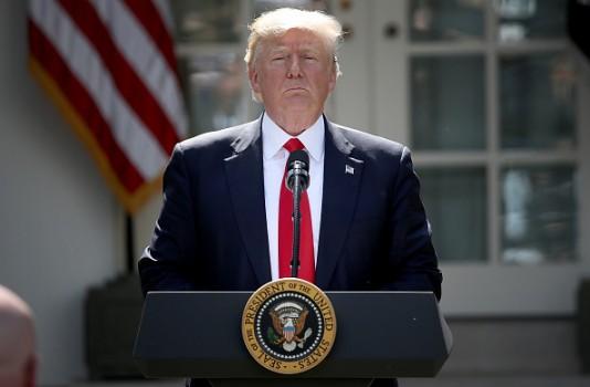 U.S. President Donald Trump concludes his announcement to withdraw the United States from the Paris climate agreement in the Rose Garden at the White House June 1, 2017 in Washington, DC. Trump pledged on the campaign trail to withdraw from the accord, which former President Barack Obama and the leaders of 194 other countries signed in 2015. The agreement is intended to encourage the reduction of greenhouse gas emissions in an effort to limit global warming to a manageable level.
