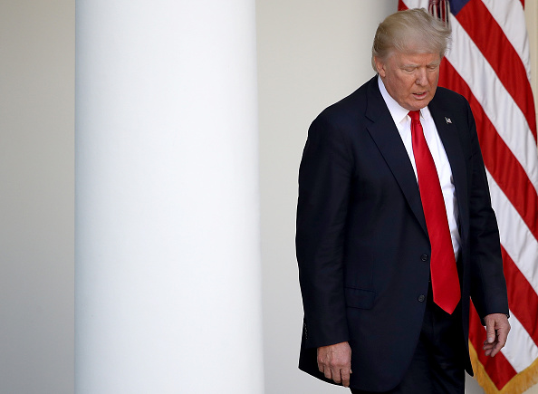 U.S. President Donald Trump concludes his announcement to withdraw the United States from the Paris climate agreement in the Rose Garden at the White House June 1, 2017 in Washington, DC. Trump pledged on the campaign trail to withdraw from the accord, which former President Barack Obama and the leaders of 194 other countries signed in 2015. President Donald Trump,Donald Trump,Paris Climate Accord,Barack Obama,Donald Trump withdraws from Paris Climate Accord