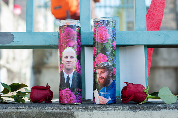 The memorial for the victims of the brutal stabbings at the Portland MAX light rail on Friday May 26 at Holliwood Transit Center Park and Ride. Ricky Best and Taliesin Myrddin Namkai Meche,Ricky Best,Taliesin Myrddin Namkai Meche,MAX train,Train Victims,Portland Honors MAX Train Victims