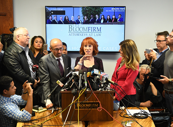 Comedian Kathy Griffin gestures during a news conference to discuss the comedian's 'motivation' behind a photo of her holding what appeared to be a prop depicting US President Donald Trump's bloodied, severed head, with her attorney, Lisa Bloom (R) in Woodland Hills, California on June 2, 2017. Kathy Griffin and her Attorney Lisa Bloom,Kathy Griffin,Attorney Lisa Bloom,Lisa Bloom,Kathy Griffin holds press conference,Attorney Lisa Bloom holds press conference,Griffin's controversial photo shoot