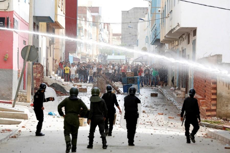 Moroccan police fire a water cannon at protesters demonstrating against alleged corruption in the provincial town of Imzouren, Morocco, June 2, 2017. Mouhcine Fikri's death has become a symbol for frustrations over official abuses and revived the spirit of the February 20 movement that spearheaded pro-democracy rallies in 2011 and prompted King Mohammed VI to cede some of his powers. Rare protests rock Morocco,Morocco,protests rock Morocco,protests at Morocco,northern Moroccan