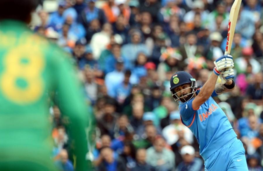 World No 8 Pakistan, on the other hand, were seen struggling throughout the innings. Their fielders dropped several catches and their bowlers bowled poor length. For India, Rohit and Shikhar started on a cautious note and just when both the batsmen seemed to be settling in the middle, rain played the spoilsport. After almost a 40-minute hold-up, with the scoreboard reading 46 runs in 9.5 overs, India regrouped their strategy and started counter-attacking. Rohit and Dhawan displayed some brilliant shots in order to boost the run rate. Rohit, who was struggling initially, got to his half-century in the 19th over with a pull that went for a six at the mid-wicket. Soon, in the very next over, Dhawan also brought up his 50 with a fine shot at backward point. After scoring 110 runs in 20 overs, both sought to exploit the conditions and poor fielding from the Pakistani players. But while doing so, Dhawan was caught at deep mid-wicket by Azhar Ali off Shadab Khan in the 25th over, breaking their 136-run partnership. Champions trophy 2017,Champions trophy,India vs Pakistan,India vs Pakistan cricket,india vs pakistan champions trophy 2017,India beat Pakistan