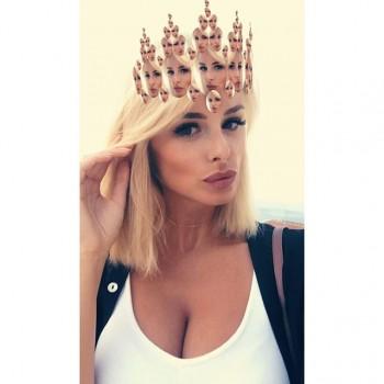 Model Rhian Marie Sugden flaunts cleavage in Bikini.