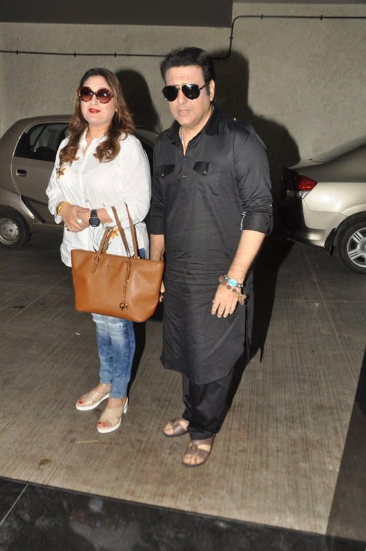 Bollywood actor Govinda with his wife Sunita Ahuja during the screening of film Dear Maya on June 4, 2017. Manisha Koirala,Rekha,Imtiaz Ali,Sohail Khan,Tabu,Shreya Chaudhary,Govinda,Sunita Ahuja,Dear Maya,Dear Maya special screening,Dear Maya special screening pics,Dear Maya special screening images,Dear Maya special screening stills,Dear Maya special screenin