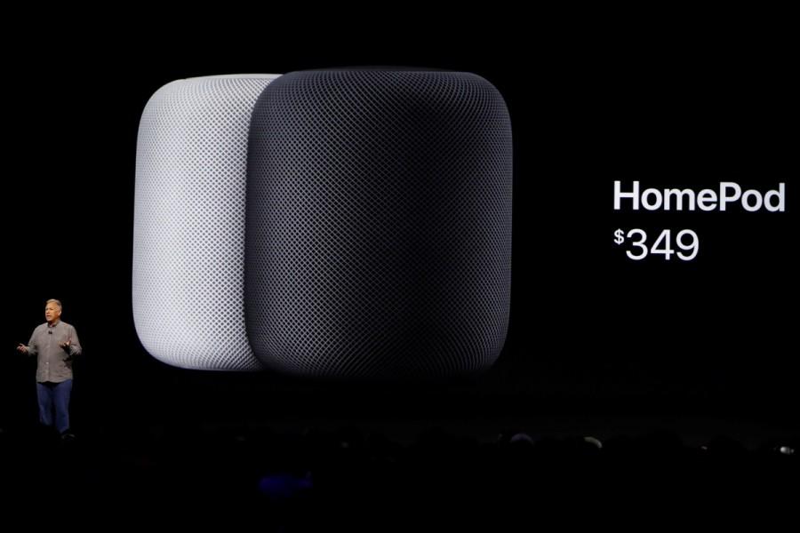 Phil Schiller, senior vice president of worldwide marketing announces the new Apple HomePod. The HomePod speaker stands just under seven inches (18 cm) tall and is covered in fabric mesh that will come in white or gray. A computer processor will tune sound to the room and beam specific parts of music, like a singer's voice, toward the listener. Apple will begin shipping the HomePod to the United States, Britain and Australia in December. WWDC 2017,WWDC,Apple,iMac,MacBook Pro series,Worldwide Developer Conference,Apple HomePod,Apple iMac