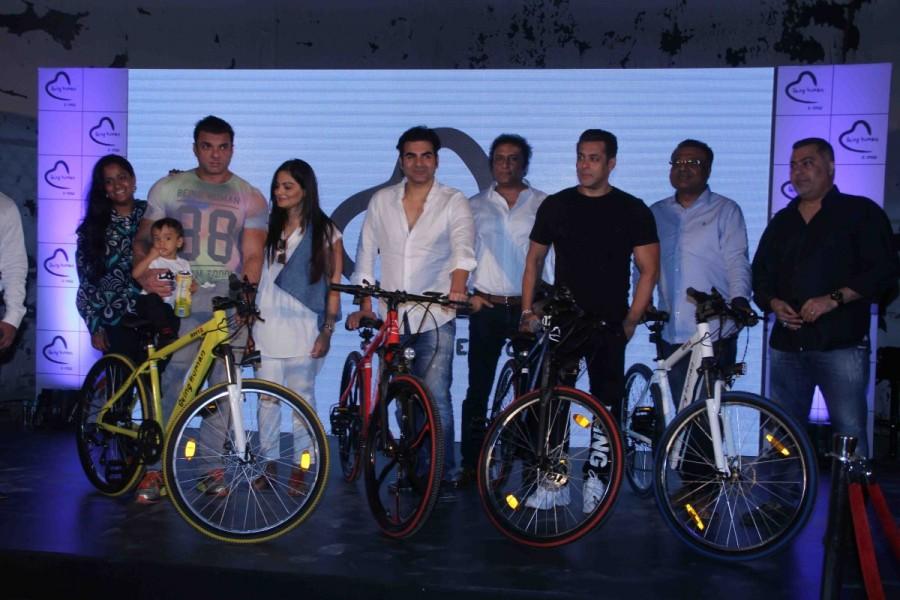 Bollywood actors Sohail Khan, Arbaaz Khan and Salman Khan during the unveiling of cycles on World Environment Day, in Mumbai on June 5, 2017. Salman Khan,actor Salman Khan,Being Human E-Cycle,World Environment Day,Sohail Khan,Arbaaz Khan,Aayush Sharma