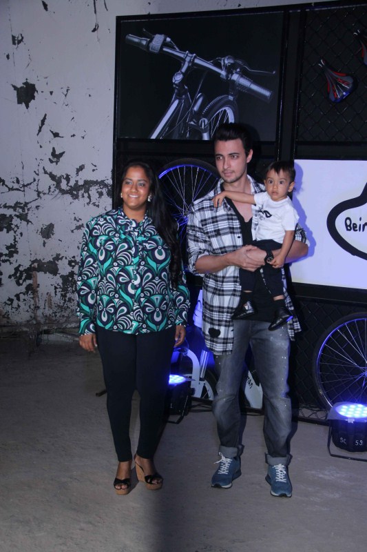 Arpita Khan along with her husband Aayush Sharma and son Ahil during the unveiling of cycles on World Environment Day, in Mumbai on June 5, 2017. Salman Khan,actor Salman Khan,Being Human E-Cycle,World Environment Day,Sohail Khan,Arbaaz Khan,Aayush Sharma
