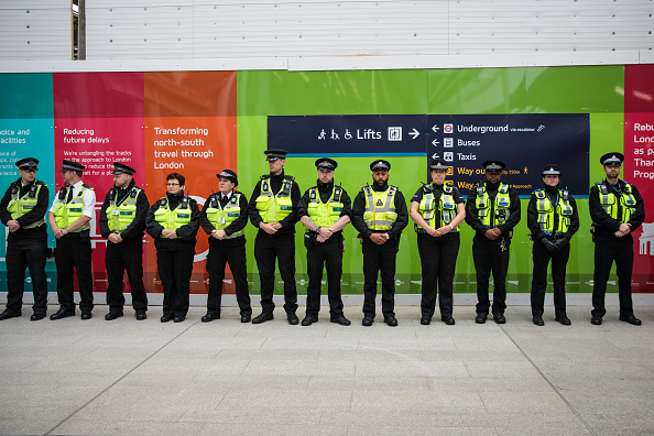 Police officers line up to observe a minute's silence for the victims of the June 3rd terror attacks at London Bridge Station on June 6, 2017 in London, England. Seven people were killed and at least 48 injured in terror attacks on London Bridge and Borough Market on June 3rd. Three attackers were shot dead by armed police. London Bridge Terror Attack,London Bridge,victims of London Bridge terror attack,Minute's silence held for victims of London Bridge terror attack