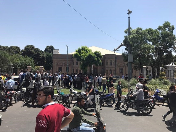 At least seven people were killed and several injured in a twin attack that struck the Iranian capital on Wednesday, Efe news reported. Gunmen attack,Gunmen attack Iranian parliament,Iranian parliament,Iranian Parliament building,Khomeini shrine,Tehran