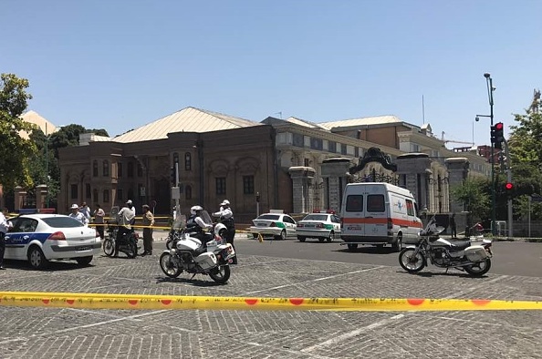 Police take security measures at the scene after gunmen opened fire at Irans parliament and the shrine of Ayatollah Khomeini in the capital Tehran, Iran on June 7, 2017. Gunmen attack,Gunmen attack Iranian parliament,Iranian parliament,Iranian Parliament building,Khomeini shrine,Tehran