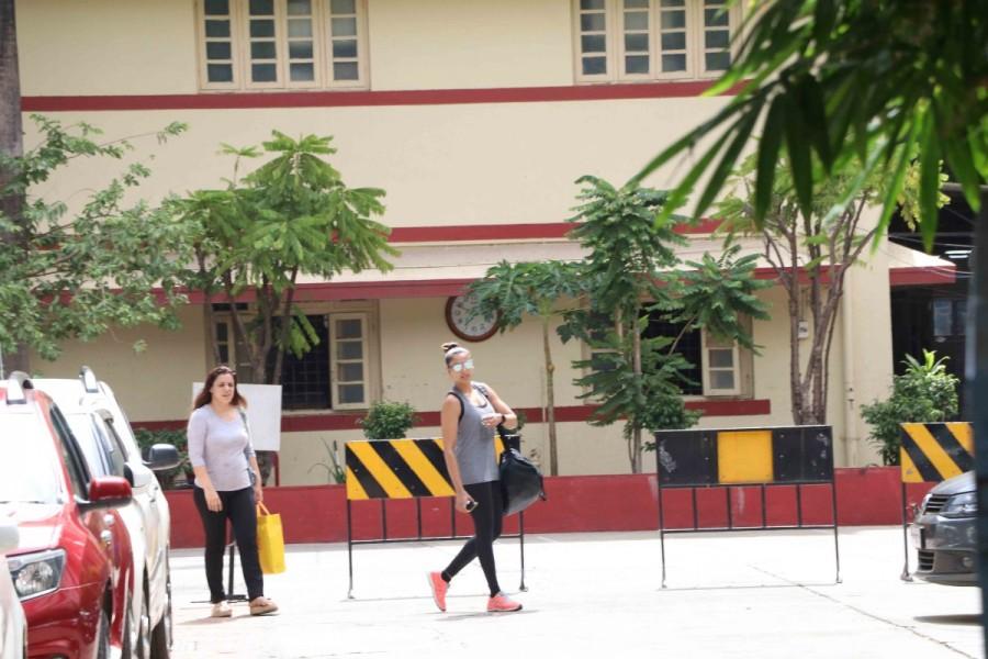 Bollywood actress Bipasha Basu spotted at gym in Bandra. Bipasha Basu and Aditya Roy Kapoor,Bipasha Basu,Aditya Roy Kapoor,Bipasha Basu spotted outside at gym,Aditya Roy Kapoor spotted outside at gym,Bipasha Basu at gym,Aditya Roy Kapoor at gym