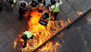 Venezuela,Venezuela capital,Violence engulfs Venezuela,teenage protester dies,Riot security forces