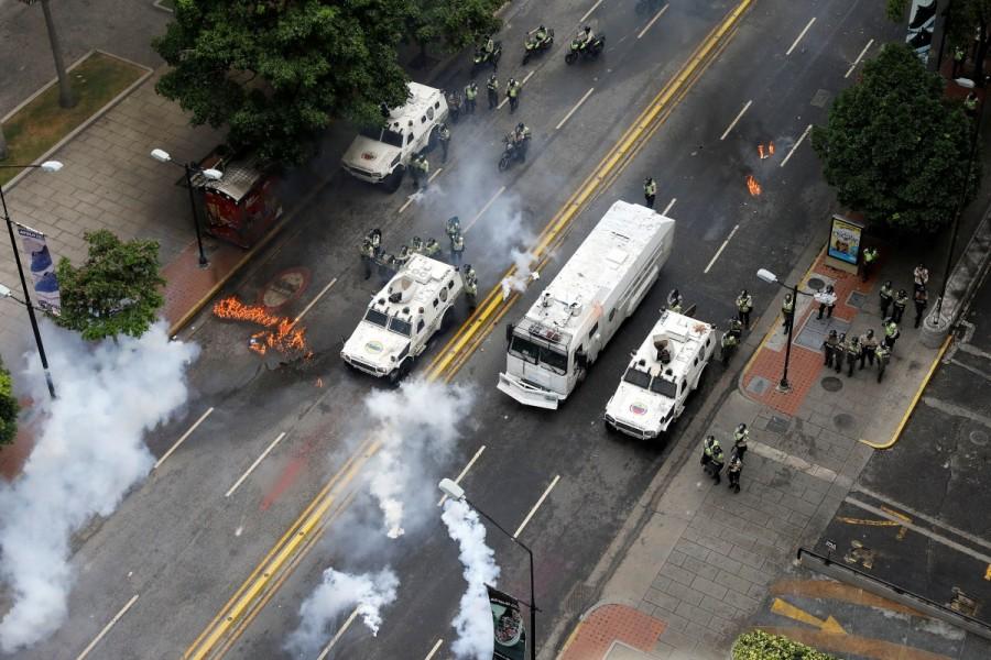 Riot security forces clash during riots at a rally against Venezuelan President Nicolas Maduro's government in Caracas, Venezuela, June 7, 2017. Venezuela,Venezuela capital,Violence engulfs Venezuela,teenage protester dies,Riot security forces