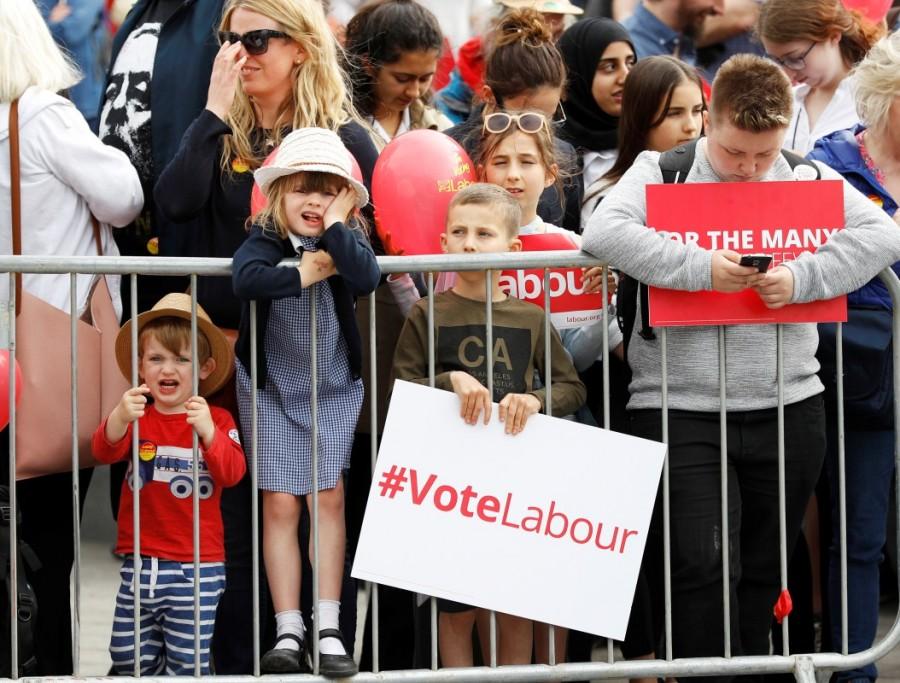 Supporters and their children wait to see Jeremy Corbyn speak in Watford. Britain's Prime Minister,Theresa May,Britain's Prime Minister Theresa May,Britain Prime Minister Theresa May,Labour Party,Jeremy Corbyn,UK campaign trail,UK General election,UK General election 2017