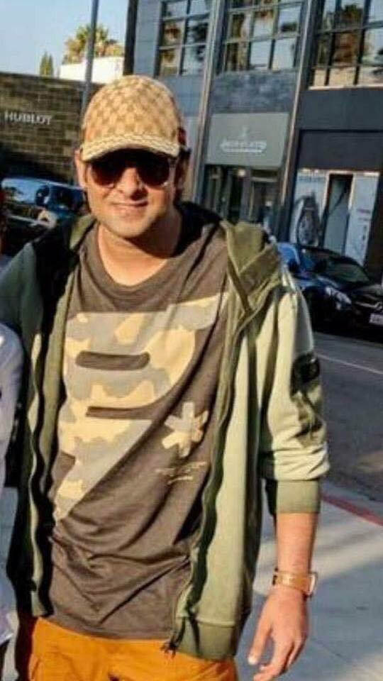The principal shooting of "Saaho", which will also be made in Tamil, Hindi and Malayalam, is expected to commence from next month. To be directed by Sujeeth, "Saaho" is rumoured to being made on a budget of over Rs. 100 crore. Shankar-Ehsaan-Loy have been roped in to compose music, while Sabu Cyril will take care of production design. Baahubali,Prabhas,Prabhas clean shaven look,Prabhas shaven look,Prabhas look for Saaho,Saaho,Prabhas avatar,Prabhas shaven avatar