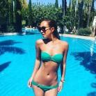 British Singer Myleene Angela Klass flaunts her fit figure in swimwear.