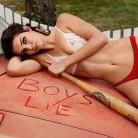 Model Kendall Nicole Jenner shows cleavage in swimsuit.