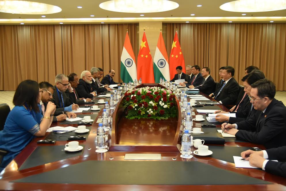 "PM Narendra Modi meets President of China Xi Jinping on margins of SCO Summit in Astana," Ministry of External Affairs spokesperson Gopal Baglay tweeted with pictures of both the leaders. Narendra Modi meets Chinese President Xi Jinping,Narendra Modi meets President Xi Jinping,Narendra Modi meets Xi Jinping,Xi Jinping,SCO summit,SCO summit 2017,Modi at SCO summit