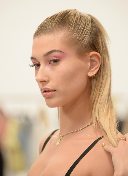 Hailey Baldwin poses backstage at Moschino Spring/Summer 18 Menswear and Women's Resort Collection in Hollywood, California. Hailey Baldwin,model Hailey Baldwin,Hailey Baldwin in tiny bodysuit,Hailey Baldwin tiny bodysuit,Hailey Baldwin in bikini,Hailey Baldwin in bikini pics,Hailey Baldwin in bikini images,Hailey Baldwin in bikini stills,Hailey Baldwin in bikini pictures