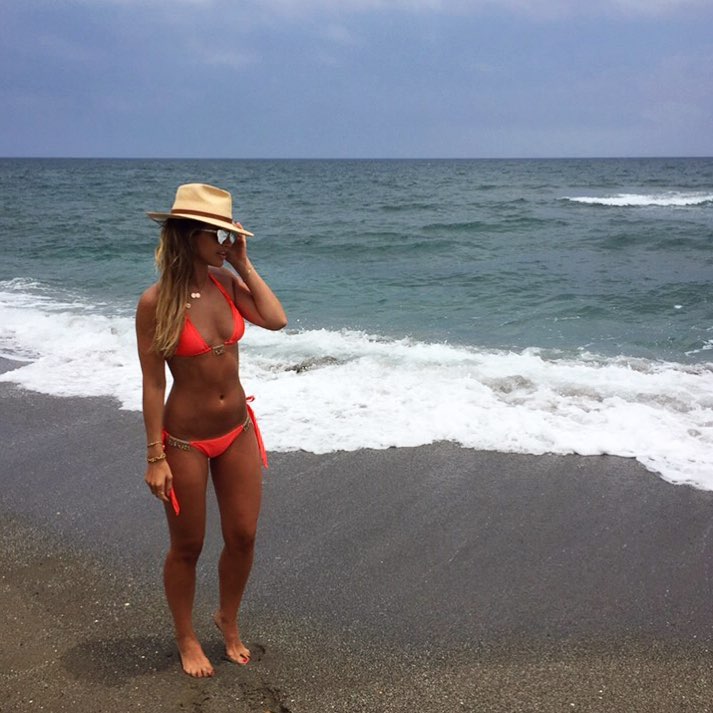 Irish model Vogue Williams flaunts her incredible body in red bikini. Vogue Williams,Vogue Williams bikini pics,Vogue Williams bikini images,Vogue Williams bikini stills,Vogue Williams curves,Vogue Williams curves pics,Vogue Williams flaunts curves,Vogue Williams hot pics,Vogue Williams hot images,Vogue Williams hot stills