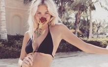 Frankie Gaff displays her perky cleavage