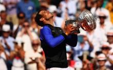 Spaniard Rafael Nadal became the first tennis player to win 10 titles in any Grand Slam tournament in the Open Era as he outclassed Stanislas Wawrinka at the French Open final here on Sunday.