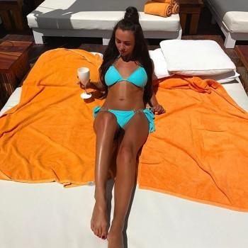 Kady McDermott sizzles in a skimpy blue bikini.