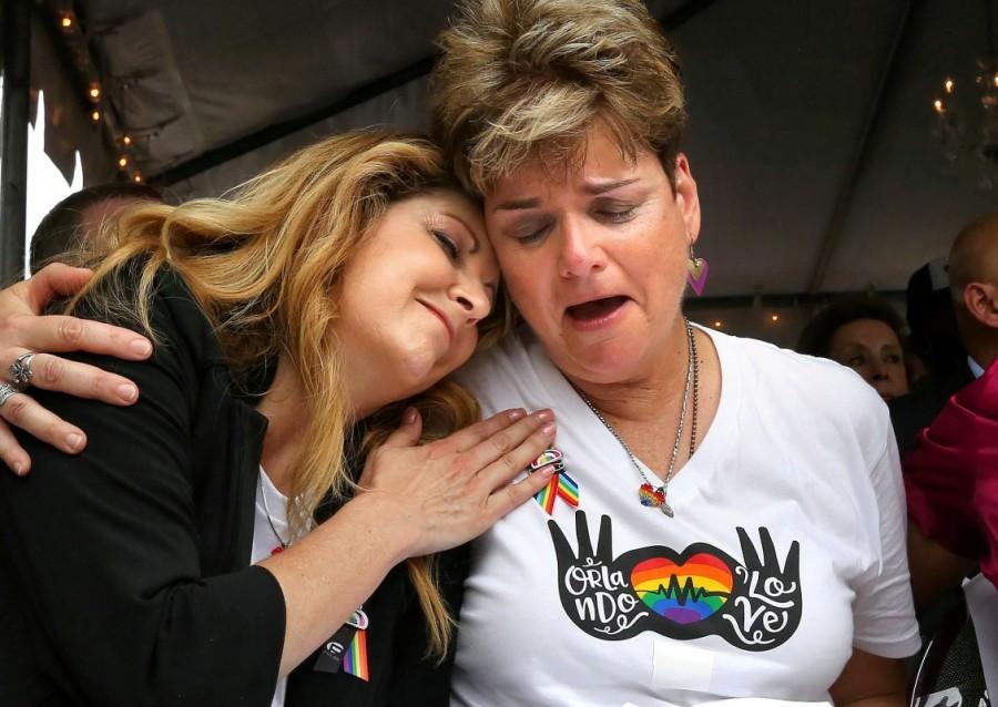 Pulse nightclub owner Barbara Poma comforts Orlando City commissioner Patty Sheehan during a ceremony at the club. Orlando,Orlando Pulse nightclub massacre,Pulse nightclub massacre,Pulse nightclub,first anniversary of Orlando's Pulse nightclub,Pulse Nightclub,pulse nightclub shooting