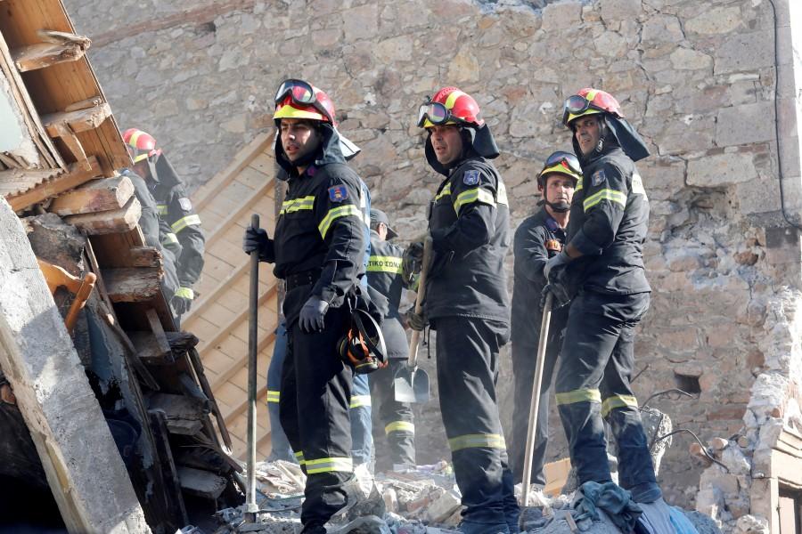 Rescue team members search for victims at a collapsed building in the village of Vrissa on the Greek island of Lesbos, Greece, after a strong earthquake shook the eastern Aegean on June 11th 2017. Earthquake strikes Greek,Earthquake strikes Lesbos,Greek island,Greek island of Lesbos