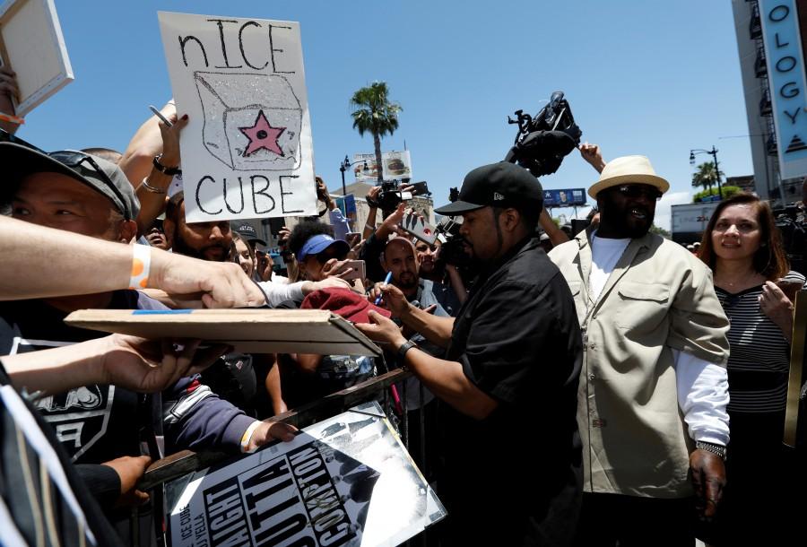Rapper Ice Cube signs autographs after unveiling his star. Ice Cube,Ice Cube gets Star on Hollywood Walk of Fame,Hollywood Walk of Fame,Star on Hollywood Walk of Fame,Ice Cube Gets Star on Walk of Fame,actor Ice Cube,Hollywood Walk of Fame pics