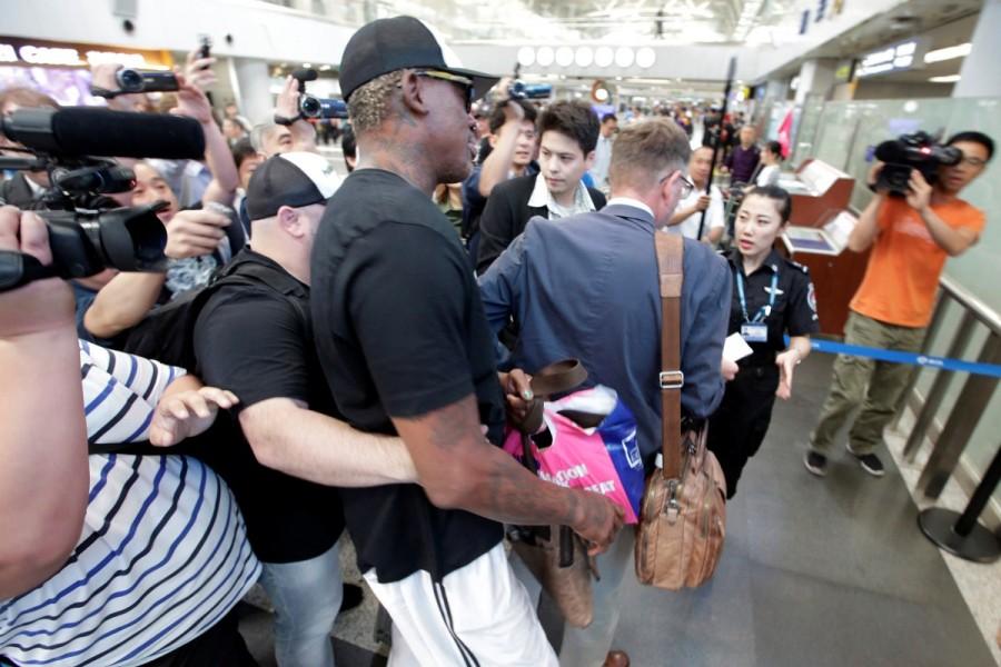Former NBA basketball player Dennis Rodman arrives at Beijing Capital International Airport as he leaves for North Korea's Pyongyang, in Beijing, China, June 13, 2017. Dennis Rodman,Dennis Rodman returns to North Korea,Dennis Rodman returns,Former NBA star Dennis Rodman,NBA star Dennis Rodman,Kim Jong Un
