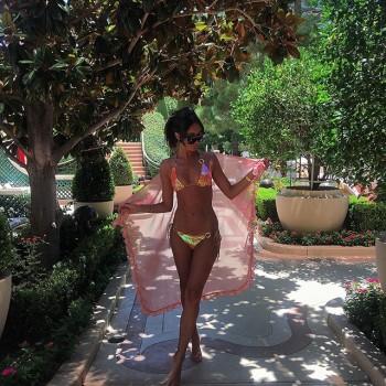 English reality television personality Megan Elizabeth McKenna shows off her eye-popping cleavage.