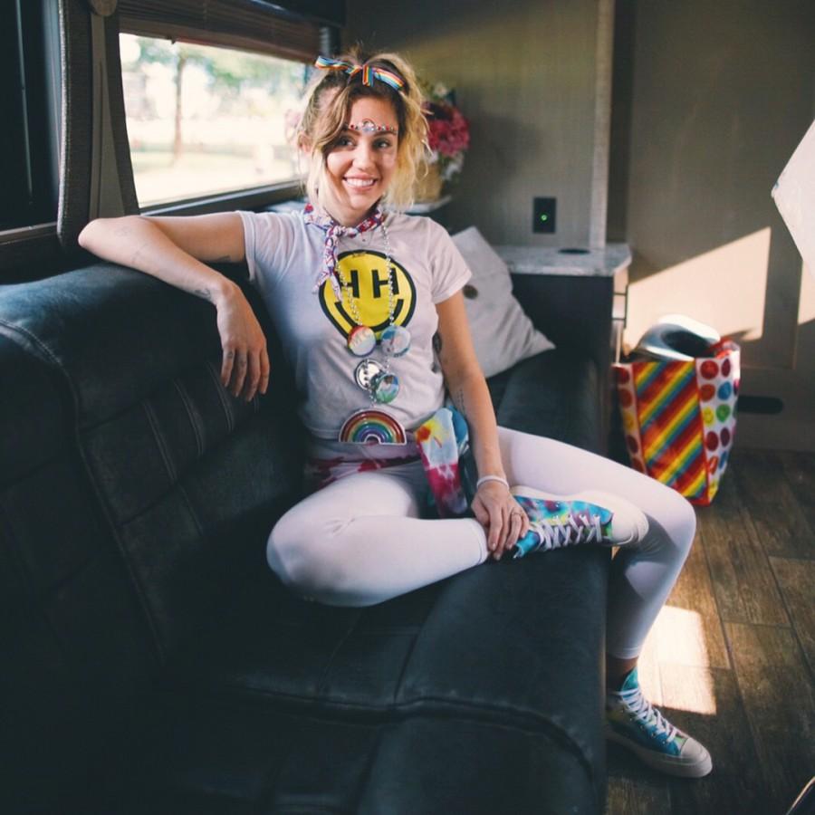 Pansexual Miley Cyrus continues to show her pride in a colorful get-up. Miley Cyrus,singer Miley Cyrus,Miley Cyrus colorful get-up,Miley Cyrus bikini pics,Miley Cyrus bikini images,Miley Cyrus bikini stills,Miley Cyrus curves,Miley Cyrus curves pics,Miley Cyrus flaunts curves,Miley Cyrus hot pics,Miley Cyrus hot images,Miley