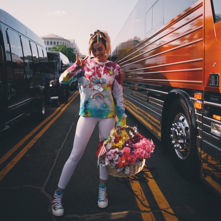 American singer Miley Cyrus continues to show her pride in a colorful get-up. Miley Cyrus,singer Miley Cyrus,Miley Cyrus colorful get-up,Miley Cyrus bikini pics,Miley Cyrus bikini images,Miley Cyrus bikini stills,Miley Cyrus curves,Miley Cyrus curves pics,Miley Cyrus flaunts curves,Miley Cyrus hot pics,Miley Cyrus hot images,Miley