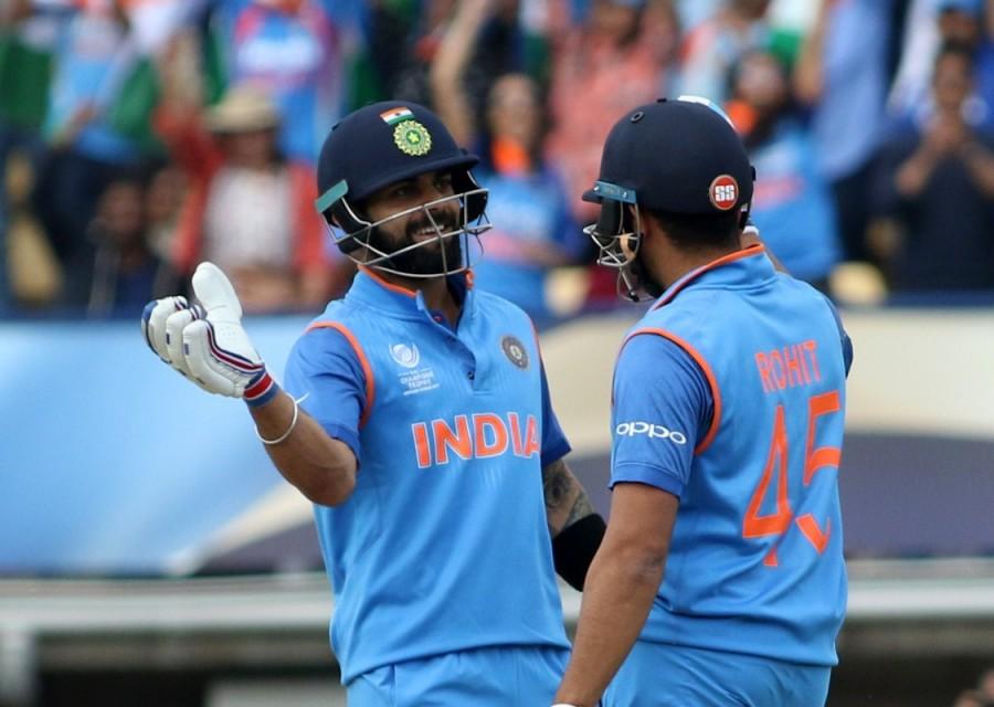 Chasing 265 to win after electing to field first, the defending champions did not flinch for one moment as Rohit Sharma scored his 11th career ton (123 not out) and captain Virat Kohli notched up his 42nd fifty (96 not out) to stitch up an unbeaten 178-run partnership for the second wicket. India won the match with 59 balls to spare. While Sharma's innings was laced with 15 fours and one six, Kohli smashed 13 boundaries. Kohli, in the process, became the fastest cricketer in the world to reach 8,000 runs in ODIs in just 175 innings. Openers Shikhar Dhawan and Sharma were off to a rollicking start in the first six overs. Champions Trophy 2017,ICC Champions Trophy 2017,India defeat Bangladesh,India beat Bangladesh,ICC Champions Trophy,India vs Pakistan,india vs pakistan champions trophy 2017