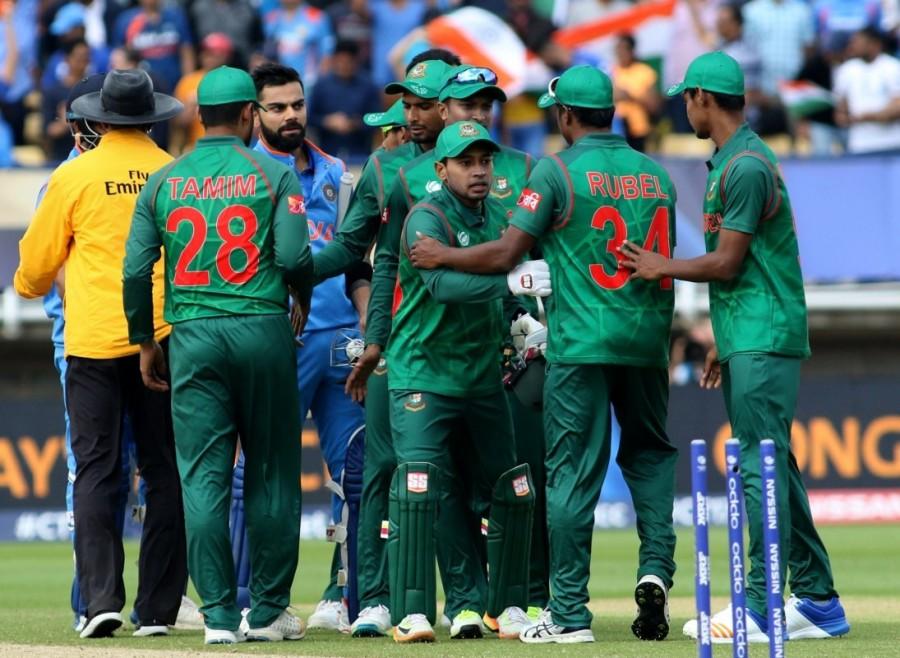 Left-arm pacer Mustafizur Rahman was taken to the cleaners as Dhawan smacked his Indian Premier League (IPL) teammate for two back-to-back fours in his very first over, while Sharma hit three boundaries in his second over. The defending champions raced to 50 in 7.5 overs with Dhawan hitting a four down the leg side off Taskin Ahmed to re-take the top spot in the run-making charts eclipsing Tamim Iqbal. He followed it up with a huge six over square-leg. After the first 10 overs of mandatory powerplay, India were 63/0. India were sailing smoothly when opposition skipper Mashrafe Mortaza rocked their ship, getting the prized wicket of Dhawan, who had made a quickfire (46; 34b; 7x4, 1x6). Trying to maintain his tempo, the Delhi batter came down the track and looked to hit over mid-off only to gift an easy catch to Mosaddek Hossain at point. Champions Trophy 2017,ICC Champions Trophy 2017,India defeat Bangladesh,India beat Bangladesh,ICC Champions Trophy,India vs Pakistan,india vs pakistan champions trophy 2017