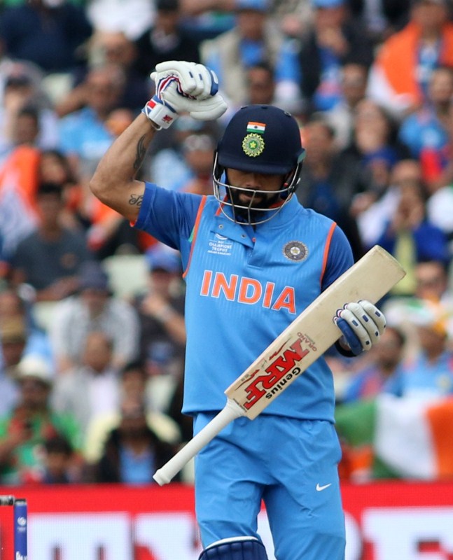 Pacers Bhuvneshwar Kumar (2/53) and Jasprit Bumrah (2/40) maintained a strict line to halt Bangladesh's scoring rate while part-timer Kedar Jadhav (2/22) emerged as the surprise package. Despite Bhuvneshwar sweeping up opener Soumya Sarkar (0) and one-down Sabbir Rahman (19), the counter-attacking intent from the Bangladesh batsmen kept the scoreboard ticking. Kohli's gamble to bowl Jadhav after all-rounder Hardik Pandya was smashed all over the park, worked wonders for the team as the off-spinner managed to break the century stand between Tamim and Mushfiqur. Jadhav, who was handed the ball for the first time in the tournament, deceived Tamim with a straight delivery which the southpaw failed to read and instead lost his leg stump while attempting a cross-bat stroke. Champions Trophy 2017,ICC Champions Trophy 2017,India defeat Bangladesh,India beat Bangladesh,ICC Champions Trophy,India vs Pakistan,india vs pakistan champions trophy 2017