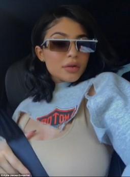 Model Kylie Kristen Jenner flaunts her assets in skintight top.