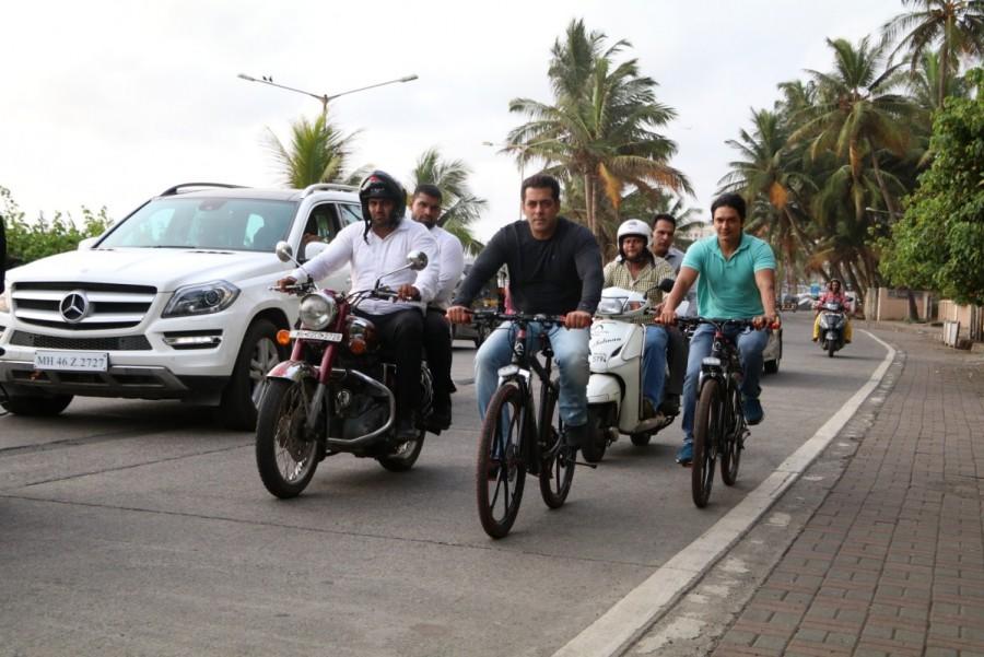 Bollywood superstar Salman Khan took his Being Human e-cycle out for a spin on the streets of Bandra in Mumbai on 16th June 2017. Salman Khan,actor Salman Khan,Salman Khan rides cycle,Salman Khan rides cycle on Bandra streets,Salman Khan cycle ride,Salman Khan cycle ride pics,Salman Khan cycle ride images,Salman Khan cycle ride stills,Salman Khan cycle ride pictures