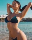 Model Rose Mawby flaunts her curves in velvet swimwear.