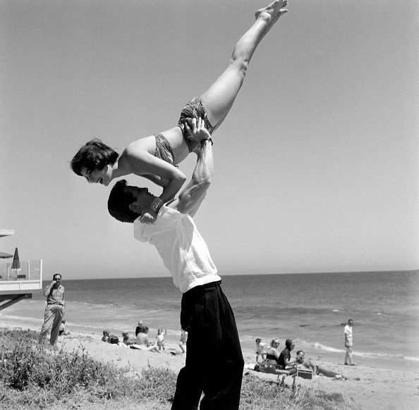 Actor Steve Rowland lifts actress Natalie Wood during the Thalians Beach Ball in Malibu, California. Beach Babes,Beach Babes pics,Beach Babes images,Beach Babes stills,Beach Babes pictures,Beach Babes photos,Beach Babes hot pics,Beach Babes hot images,Beach Babes hot stills,Beach Babes hot pictures