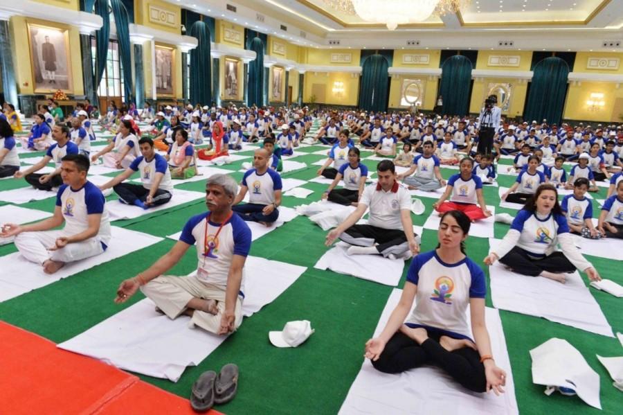 "In ancient India, all disciplines were integrated to appear as one in the form of yoga. I advise you to continue practicing yoga throughout the year," Mukherjee told a gathering of enthusiastic children, youths and elderly people. President Pranab Mukherjee,Pranab Mukherjee,Pranab Mukherjee Yoga,International Day of Yoga,International yoga Day,World yoga day