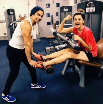 With all three actors - Varun, Taapsee and Jacqueline giving a slice of the fun they are all having while shooting on social media, we can't but wait to see what the film has in store. Recently we saw a short video of this trio having fun on sets of Judwaa 2 and even the one where Taapsee turned Punjabi tutor for Jacqueline. Yet again, Varun took to social media this morning with a picture of Taapsee and him in the gym proving that these two are bonding over fitness too. Both Varun and Taapsee are fitness freaks in their own way and love to stay active and this post truly proves that! In fact we hear they spend time working out together and sharing fitness tips and regimes with each other. Taapsee being an expert squash player even took Varun to court and played the game with him.