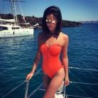 Model Lucy Mecklenburgh shows her toned figure in swimsuit.