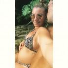 Billi Mucklow flaunts her blossoming baby bump.