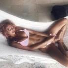 Australian model Sahara Ray shows off pin-up physique in nautical bikini.