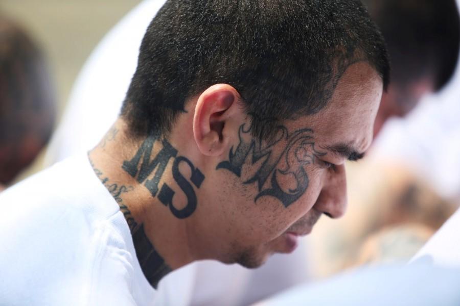 MS-13 gang members wait to be escorted upon their arrival at the maximum-security jail in Zacatecoluca, June 22, 2017. MS-13 gang,MS-13,MS-13 gang members,Members of MS-13,El Salvador,crime-ravaged,Central American nation